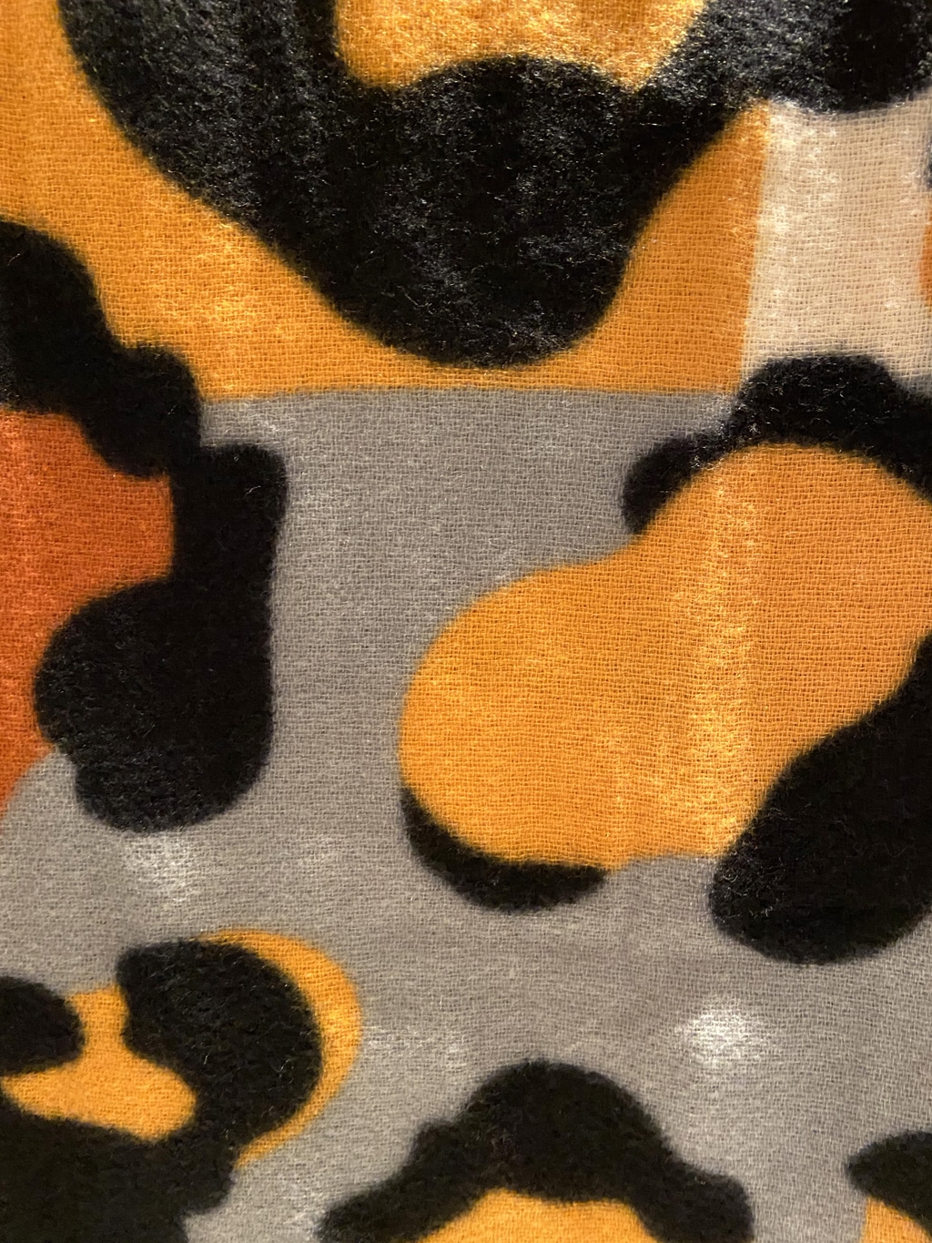 Giraffe print thick winter scarf close up