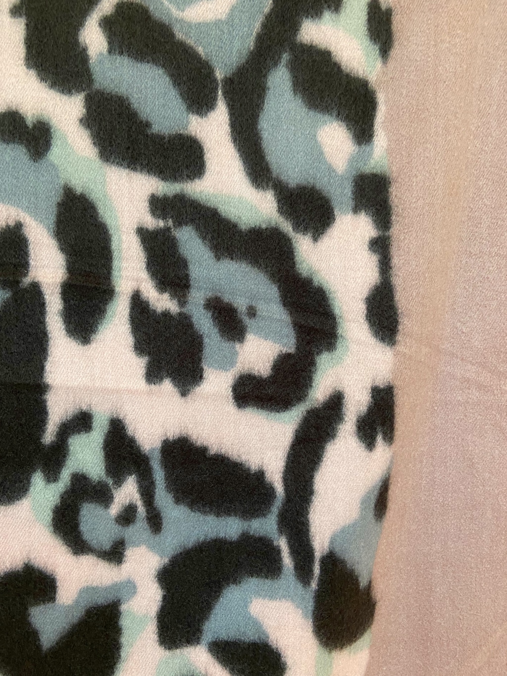 blush and leopard print scarf closeup